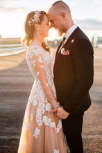 Trumpet/Mermaid Floor-Length Tulle Long Sleeves Wedding Dresses with Appliques Lace